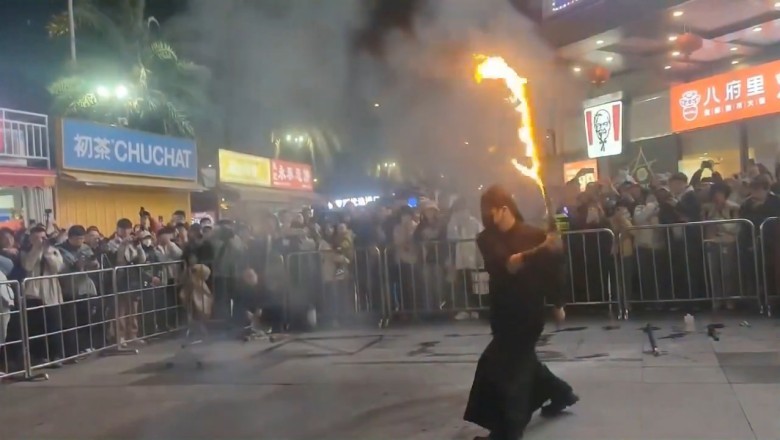 Flaming Mishap: Fire Breather Accidentally Ignites Spectator in Fujian