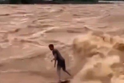 Daredevil Surfer Embraces Nature’s Fury: Paulo Guido Coelho Rides the Swollen Doce River