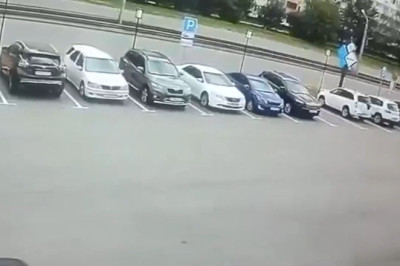 Parking Lot Surprise: Epic Water Source Explosion Caught on Camera!